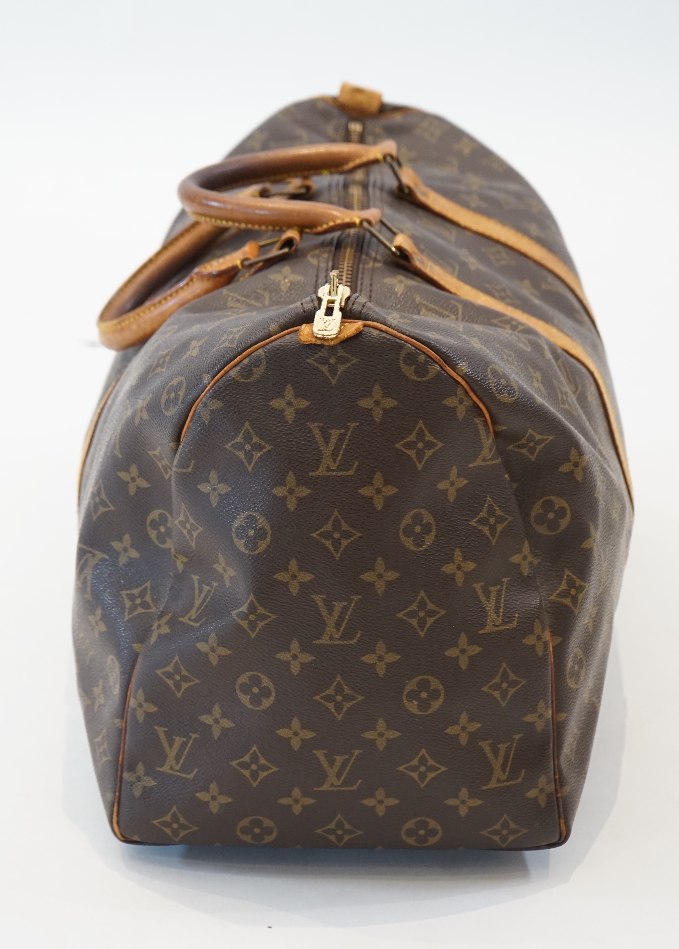 A Louis Vuitton Speedy 40 bag width 22cm, length 51cm, height 28cm